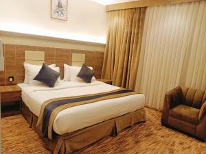 Postel nebo postele na pokoji v ubytování Marjan Rose Hotel فندق مرجان روز + 20 fotografií