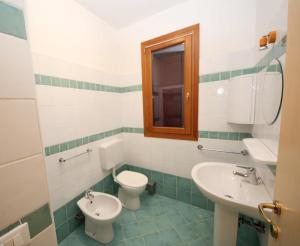 Koupelna v ubytování Residence Sole e Mare appartamenti