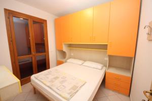 Postel nebo postele na pokoji v ubytování Residence Sole e Mare appartamenti