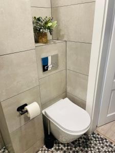 Koupelna v ubytování JANO apartment Klaipėda City Center