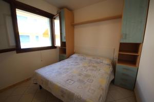 Postel nebo postele na pokoji v ubytování Residence Sole e Mare appartamenti