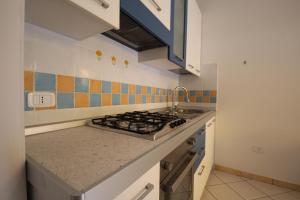 Kuchyň nebo kuchyňský kout v ubytování Residence Sole e Mare appartamenti