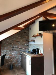Kuchyň nebo kuchyňský kout v ubytování Apartments PKT DeLux