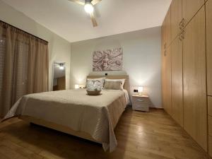 Katil atau katil-katil dalam bilik di Sitia Beach Apartment +47 gambar