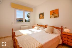 Posteľ alebo postele v izbe v ubytovaní Villa La Paloma Blanca by Abahana Villas