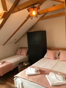Postel nebo postele na pokoji v ubytování Apartments PKT DeLux