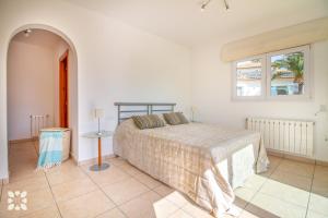Posteľ alebo postele v izbe v ubytovaní Villa La Paloma Blanca by Abahana Villas