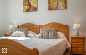 Posteľ alebo postele v izbe v ubytovaní Villa La Paloma Blanca by Abahana Villas
