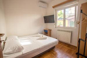 A bed or beds in a room at Late Story