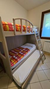 Postel nebo postele na pokoji v ubytování Residence Sole e Mare appartamenti