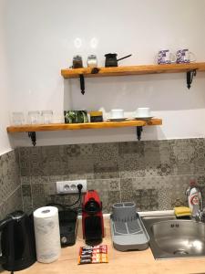 Kuchyň nebo kuchyňský kout v ubytování Apartments PKT DeLux