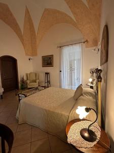 Postel nebo postele na pokoji v ubytování Donna Concetta casa vacanze