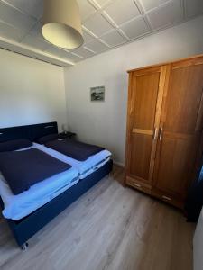 Postel nebo postele na pokoji v ubytování Ferienhaus Maite