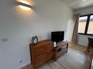 TV a/nebo společenská místnost v ubytování Ferienhaus Maite