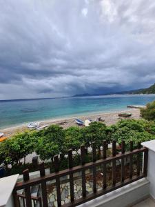 a view of a beach with boats in the water at Beach House Antonis Avlakia in Avlákia