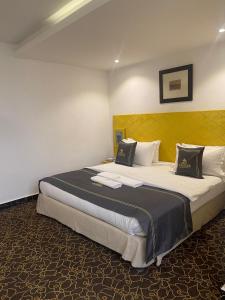 Postel nebo postele na pokoji v ubytování Hotel 5092