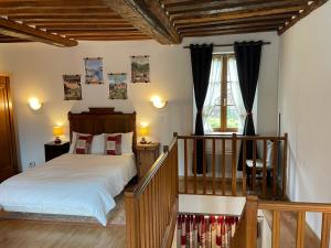 Posteľ alebo postele v izbe v ubytovaní Le Douet Fleury - Chambre d'Hôtes et Gîtes
