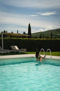 Bazén v ubytování Cappuccina Country Resort nebo v jeho okolí