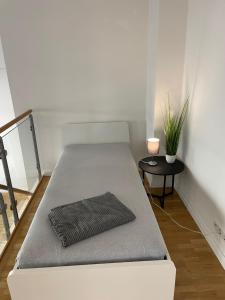 Llit o llits en una habitació de "Appartment Moonart Loft " Leipzig-Zentrum