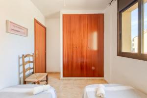 Posteľ alebo postele v izbe v ubytovaní Mirablau F 1 1 Empuriabrava Gran Reserva - Immo Barneda