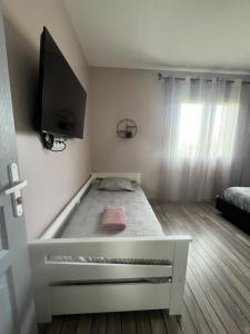 Chambres d'Hôtes chez Estelle客房内的一张或多张床位