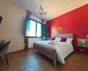 A bed or beds in a room at B&B Domu Mea