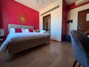A bed or beds in a room at B&B Domu Mea