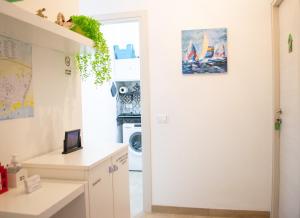 Kuchyň nebo kuchyňský kout v ubytování Dolce Hogar Residence + 43 fotografií