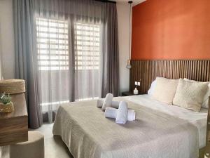 Postel nebo postele na pokoji v ubytování Αura Luxury Apartments