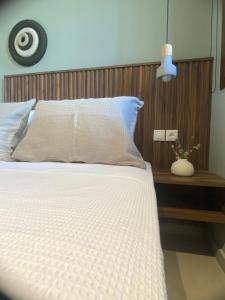 Postel nebo postele na pokoji v ubytování Αura Luxury Apartments