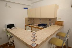 Kuchyň nebo kuchyňský kout v ubytování Apartment Matija