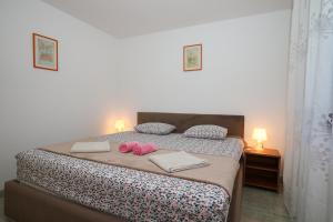 Postel nebo postele na pokoji v ubytování Apartment Matija