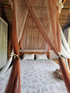 เตียงในห้องที่ PANAKLUEA Cottage & Crafts - พนาเกลือ