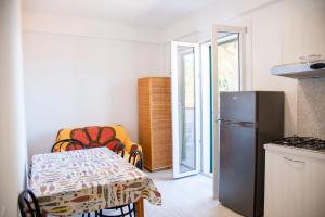 Kuchyň nebo kuchyňský kout v ubytování Residence Hotel Villa Mare + 37 fotografií
