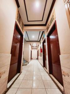 a corridor of a building with at Hotel New Taj International in Rawalpindi