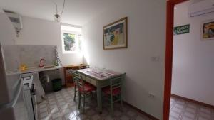 A kitchen or kitchenette at Domus Anxur