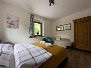 Łóżko lub łóżka w pokoju w obiekcie Apartamenty Komarno 46 Jacuzzi&Sauna