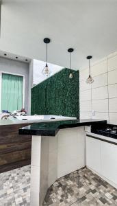 A cozinha ou cozinha compacta de Casa em Ubajara