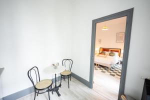 Posteľ alebo postele v izbe v ubytovaní Villa Vichéia - Appartement 13
