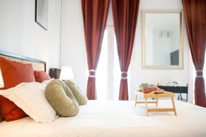 Posteľ alebo postele v izbe v ubytovaní Villa Vichéia - Appartement 13