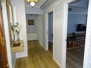 a hallway with a door leading into a living room at A casa da Abunana in Cangas de Morrazo