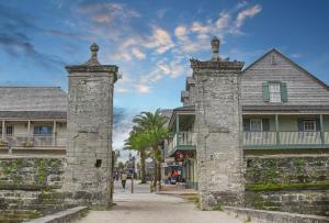 an old stone building with two towers on a street at Game room ,Saltwater ,pool Spa - Tropical Oasis! in Palm Coast