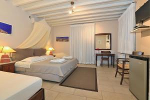 Postel nebo postele na pokoji v ubytování Petali Village Hotel + 37 fotografií