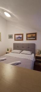 Postel nebo postele na pokoji v ubytování Apartman Beus