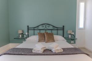 Ένα ή περισσότερα κρεβάτια σε δωμάτιο στο Diamond Apartments +118 φωτογραφίες