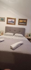 Postel nebo postele na pokoji v ubytování Apartman Beus