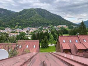 a view of a town from the roof of a house at Mandi Mandi in pista in Tarvisio