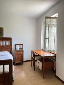 Posteľ alebo postele v izbe v ubytovaní Alta Valle Intelvi LA MARINELLA