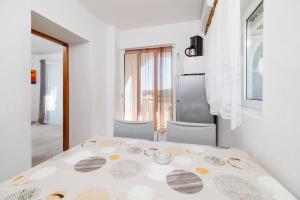 Postel nebo postele na pokoji v ubytování Apartments Ivan