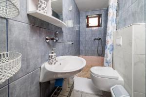Koupelna v ubytování Apartments Slobodanka